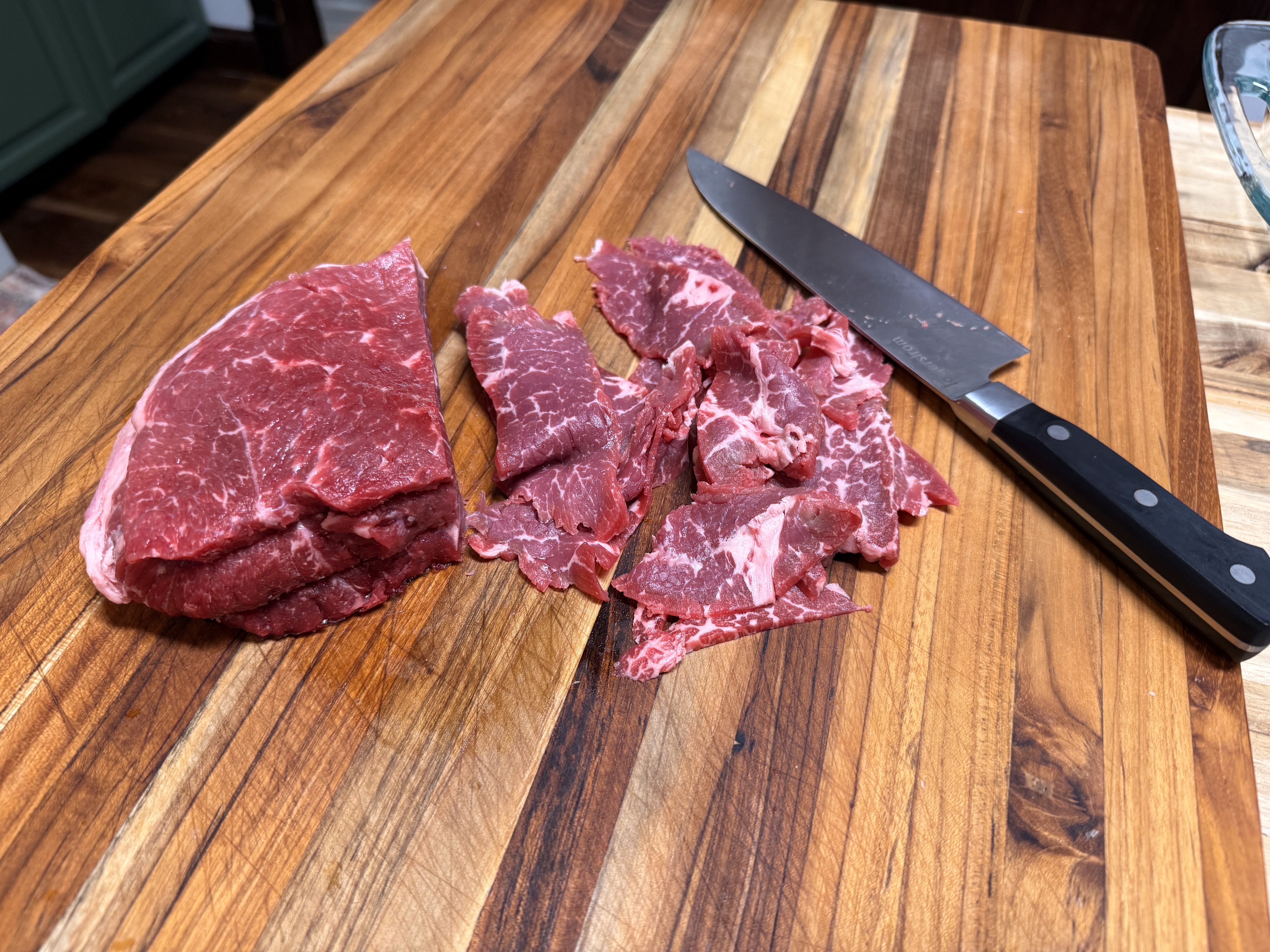 Slicing nearly frozen meat