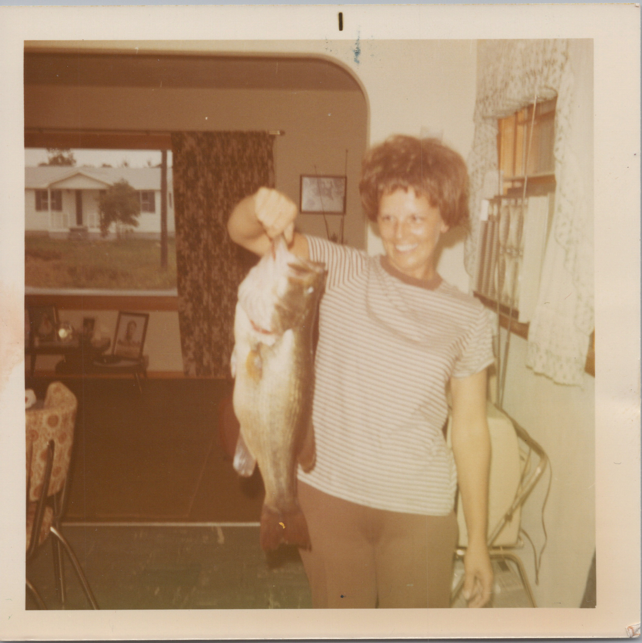 Bass caught by Grandpa, he would gut them and she would cook them